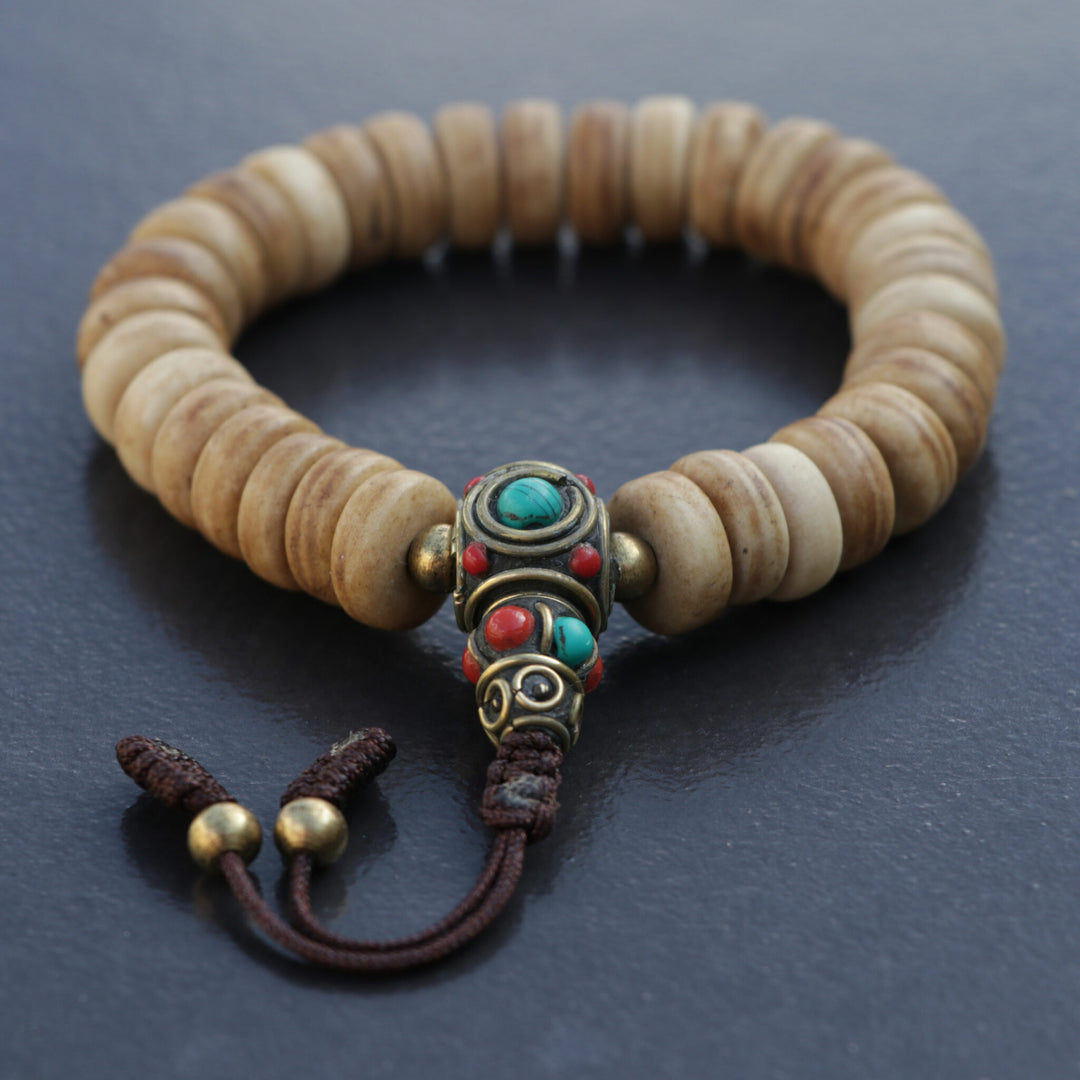 Brown Yak Bone Wrist Mala with Inlaid Brass Bead