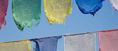 What are the prayers on a Buddhist prayer flag about?