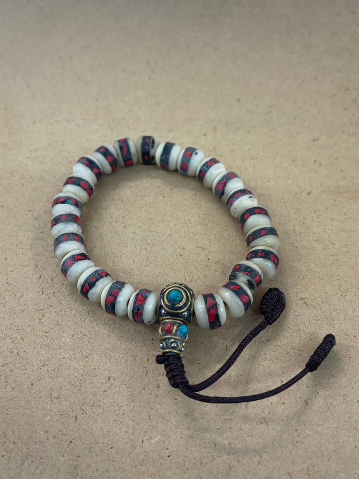 Red & White Yak Bone Wrist Mala with Inlaid Brass Bead