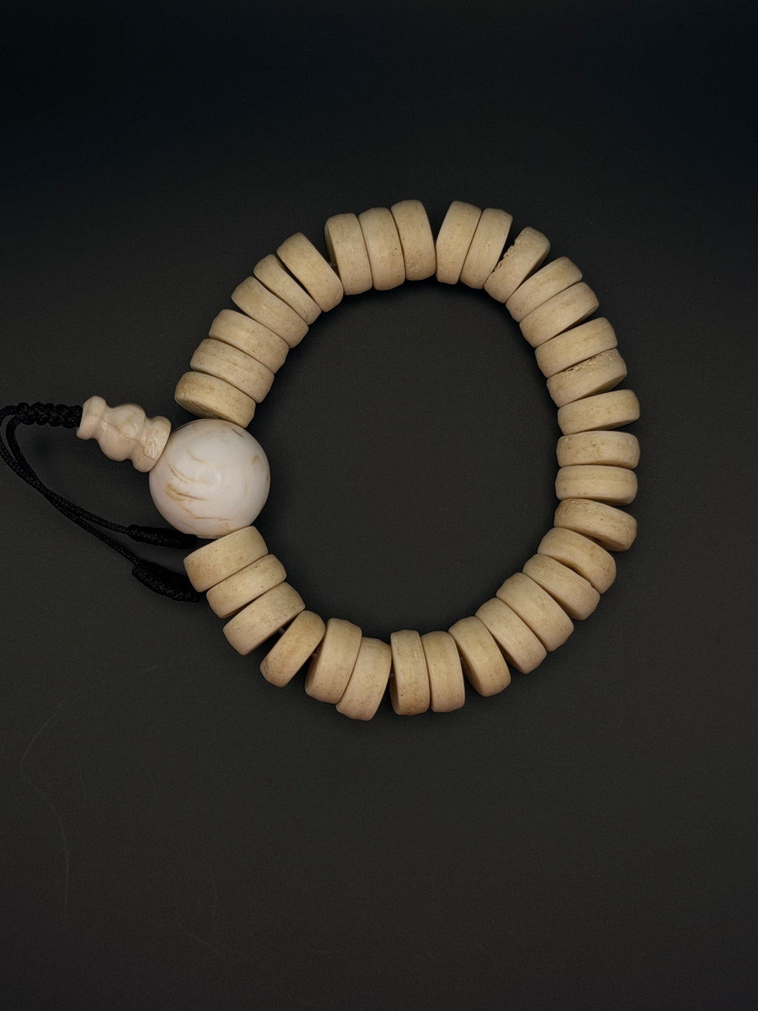 Brown Yak Bone Wrist Mala with Inlaid Brass Bead