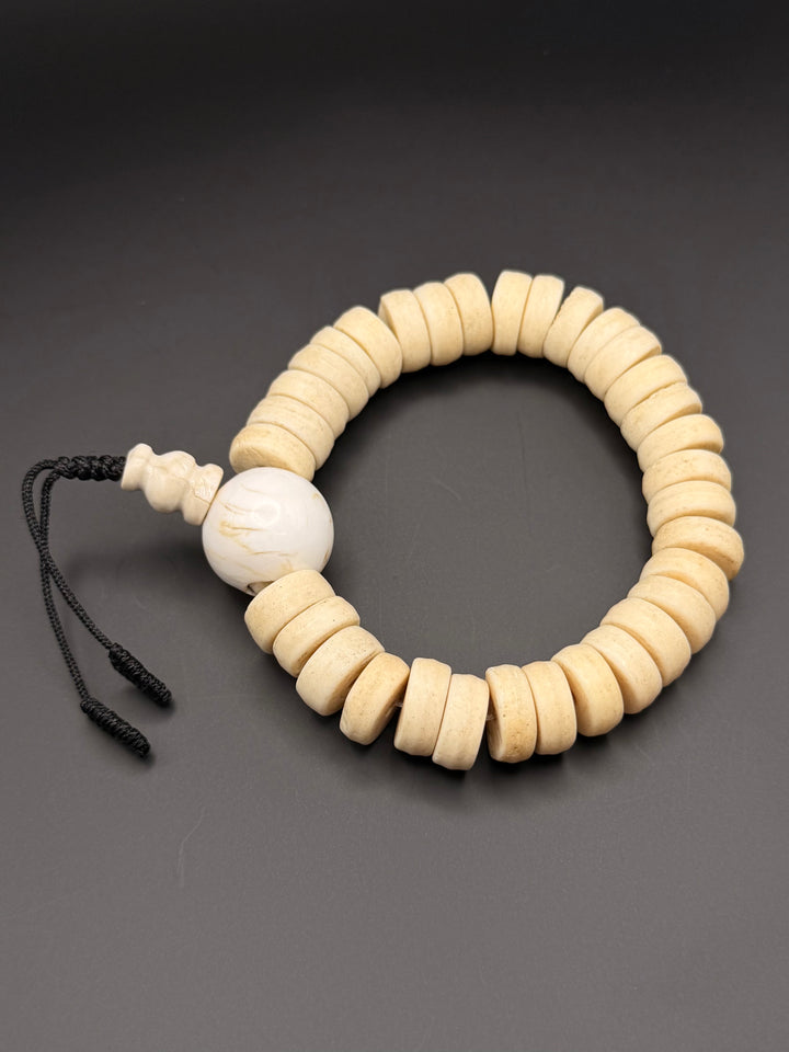 Brown Yak Bone Wrist Mala with Inlaid Brass Bead