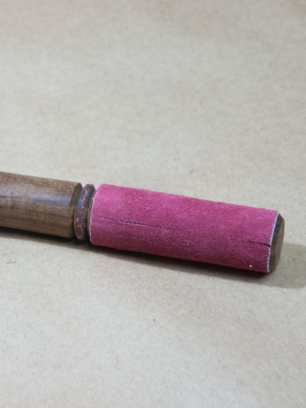 Red suede singing bowl stick