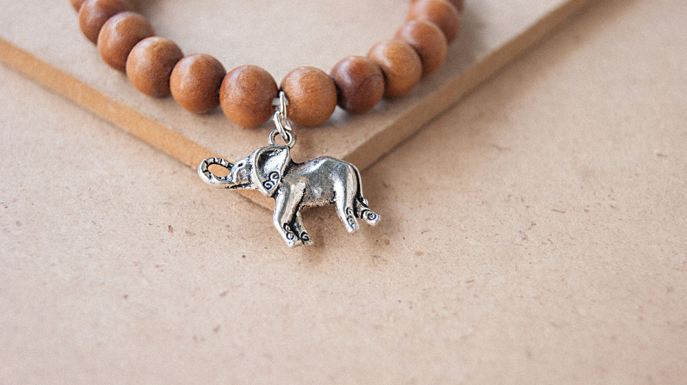 Charmed Mala - Sandal Wood Beaded Bracelet With Charm ( Elephant )