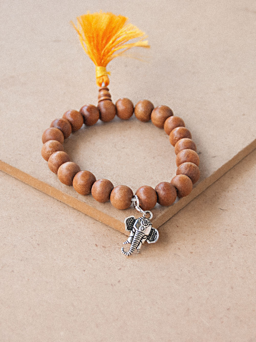 Charmed Mala - Sandal Wood Beaded Bracelet With Charm ( Ganesh )