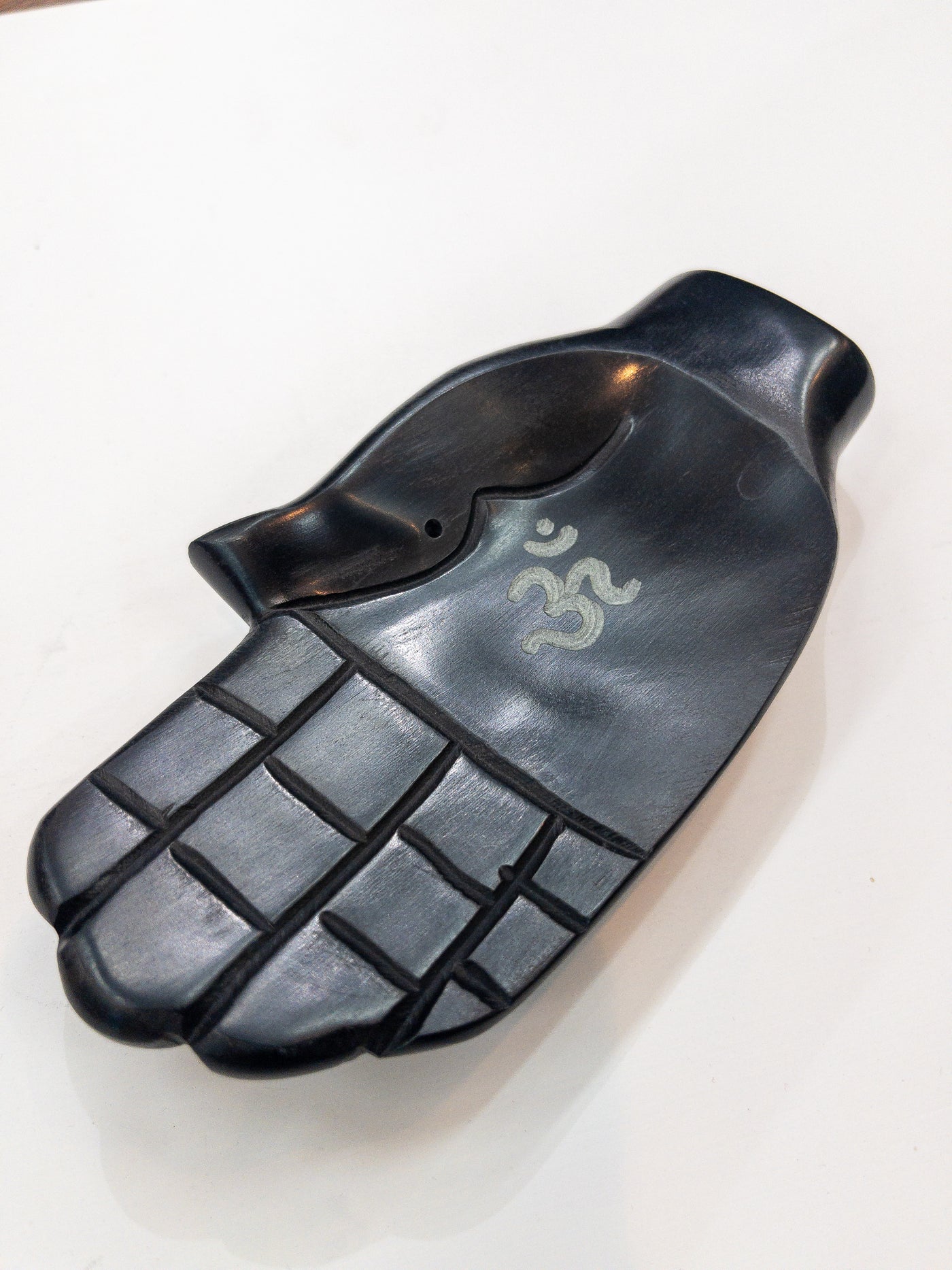 Soapstone hand with om incense burner
