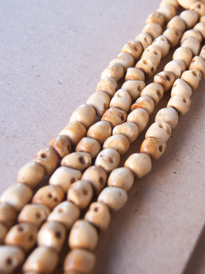 Malabead - Brown SkullBone Mala Bead